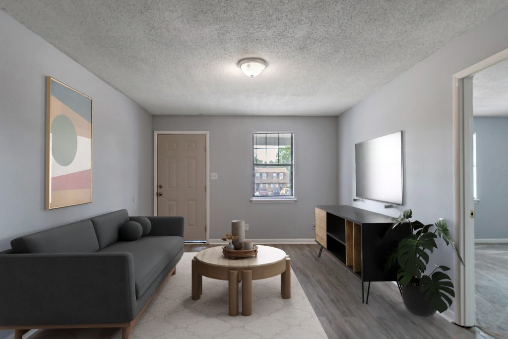 Renovated living room with plank flooring